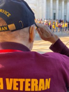 Client Ray saluting