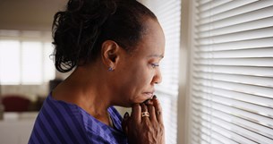 bigstock-an-older-black-woman-mournfull-168286880-1.jpg