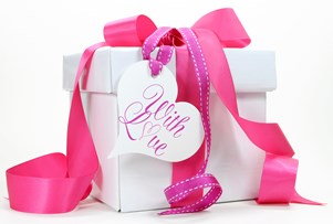 bigstock-beautiful-pink-and-white-gift-56139569-1.jpg