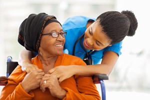 bigstock-happy-senior-patient-with-frie-49942211-1.jpg