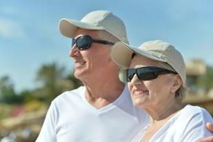 bigstock-senior-couple-at-sea-in-sungla-61903754.jpg