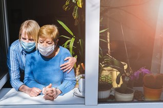 bigstock-two-women-an-old-mother-and-h-364085581.jpg