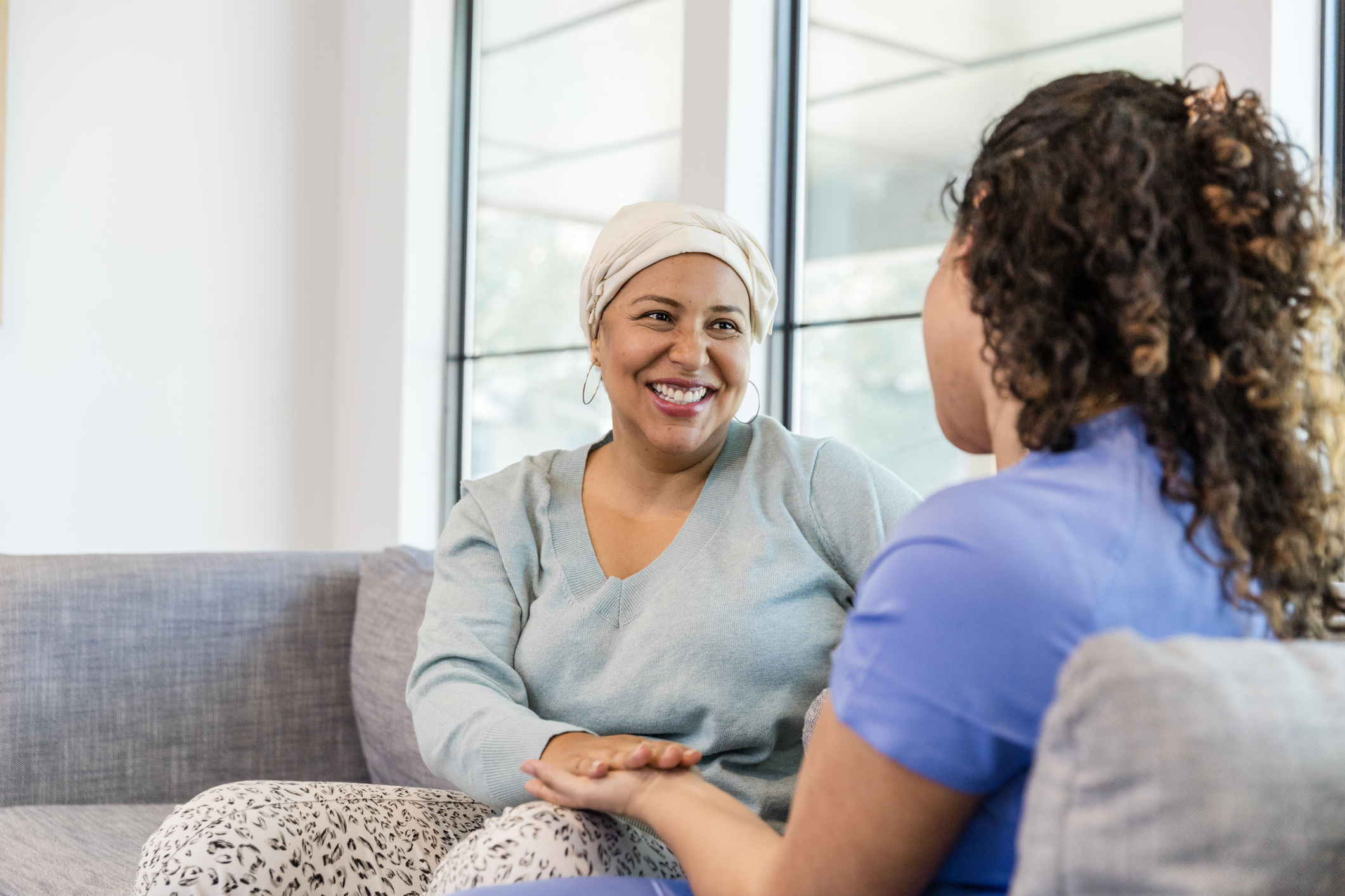 SYNERGY HomeCare cancer patient speaking with caregiver